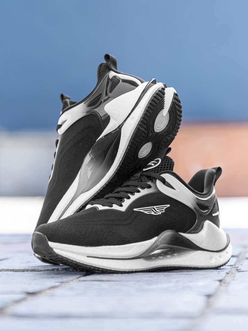 Myntra red tape sports shoes deals