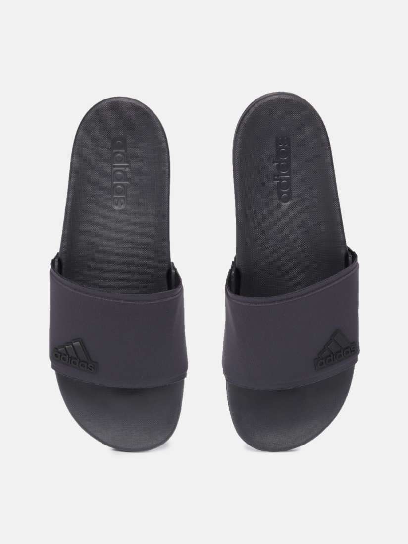 All black adidas sliders top