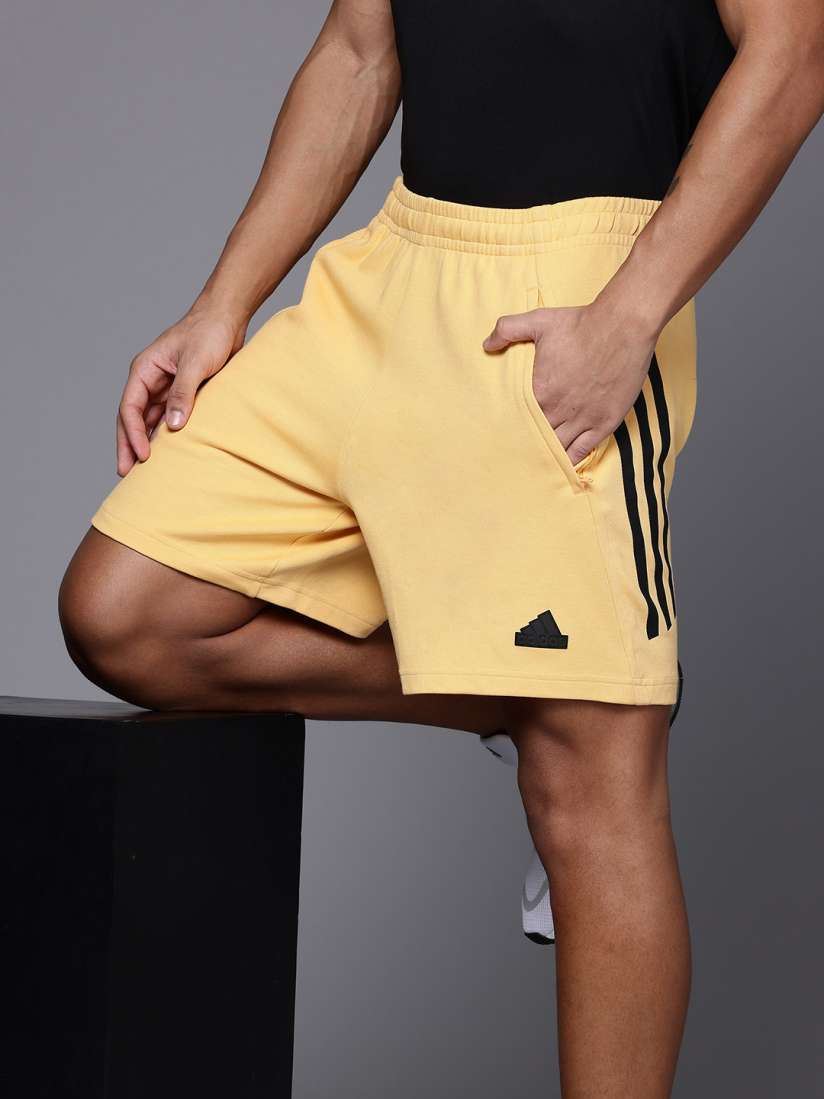Yellow adidas shorts 2025