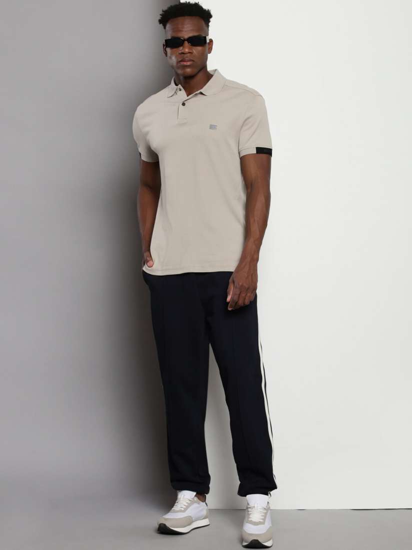 Buy Tommy Hilfiger Men Mid Rise Pure Cotton Joggers Track Pants for Men 26807986 Myntra