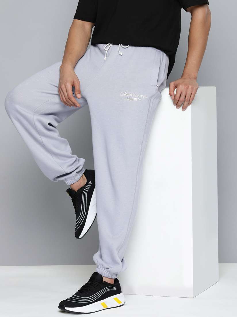 Buy Puma Men Pure Cotton Relaxed Fit Mid Rise CLASSICS Joggers Track Pants for Men 27157048 Myntra