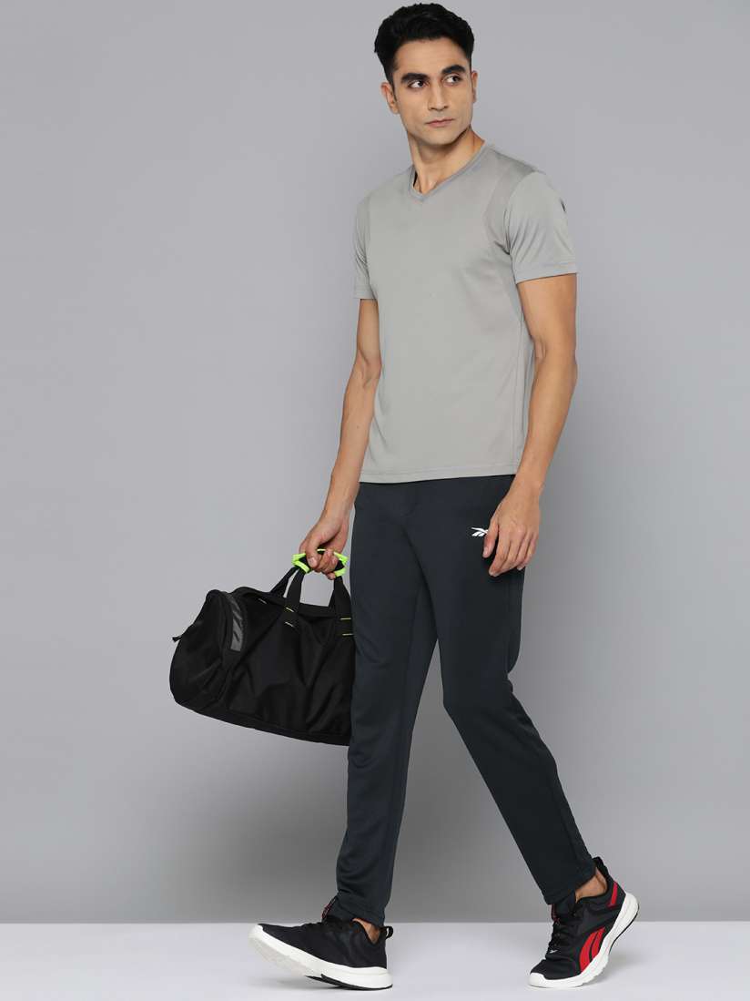Buy Reebok Men Slim Fit Speedwick Sports Track Pants Track Pants for Men 28422662 Myntra