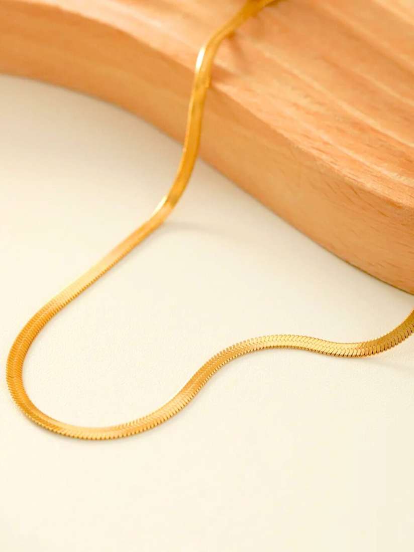 Snake pattern gold chain top