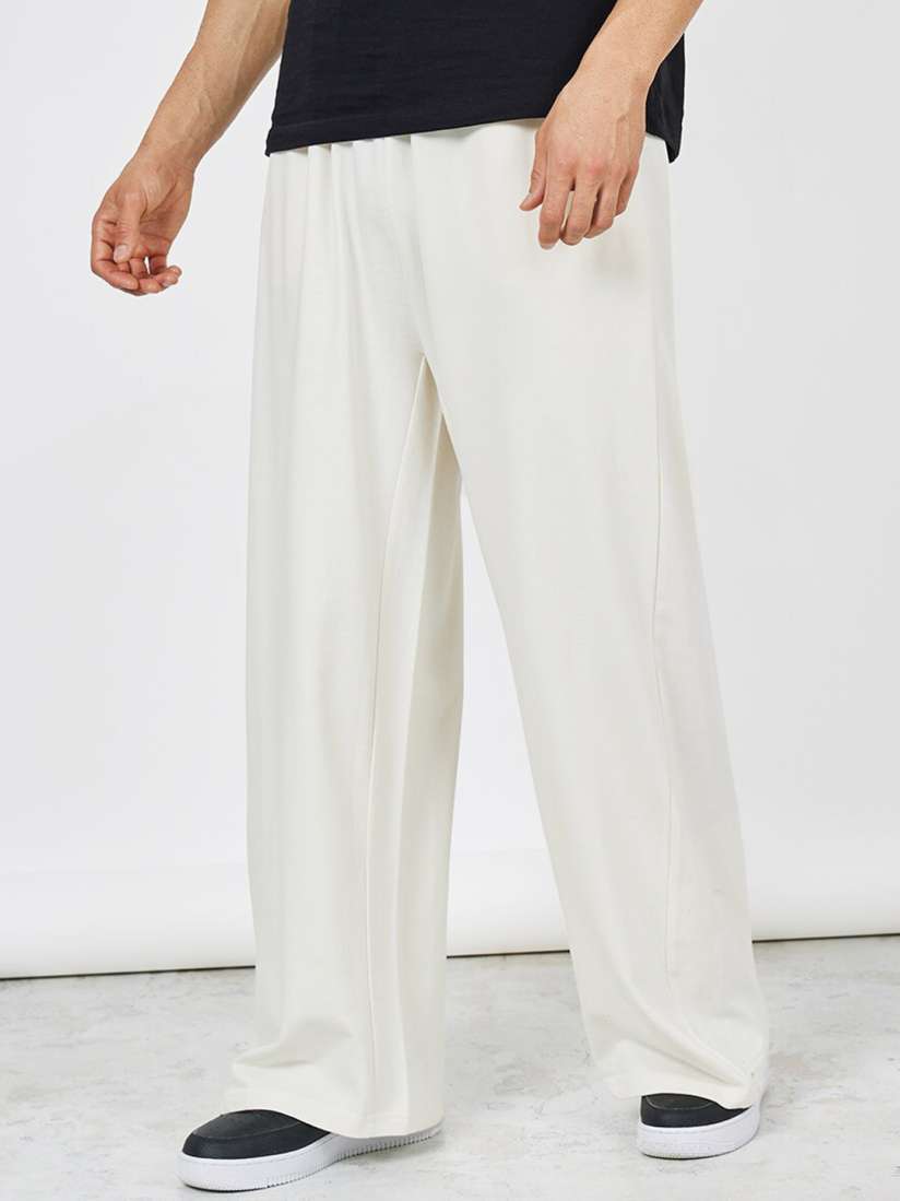 Buy Styli Men Cream Coloured Flared Fit Mid Rise Wide Legged Cotton Terry Track Pants Track Pants for Men 28631254 Myntra