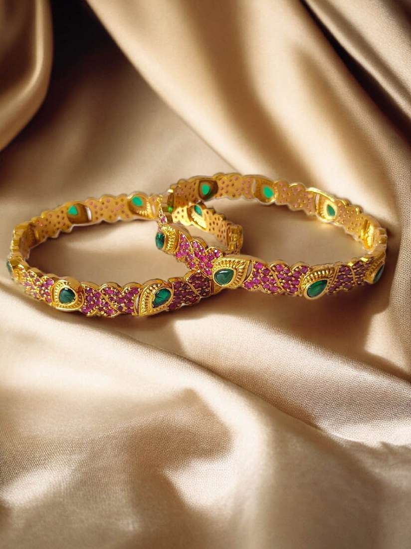 Two gold bangles 2025