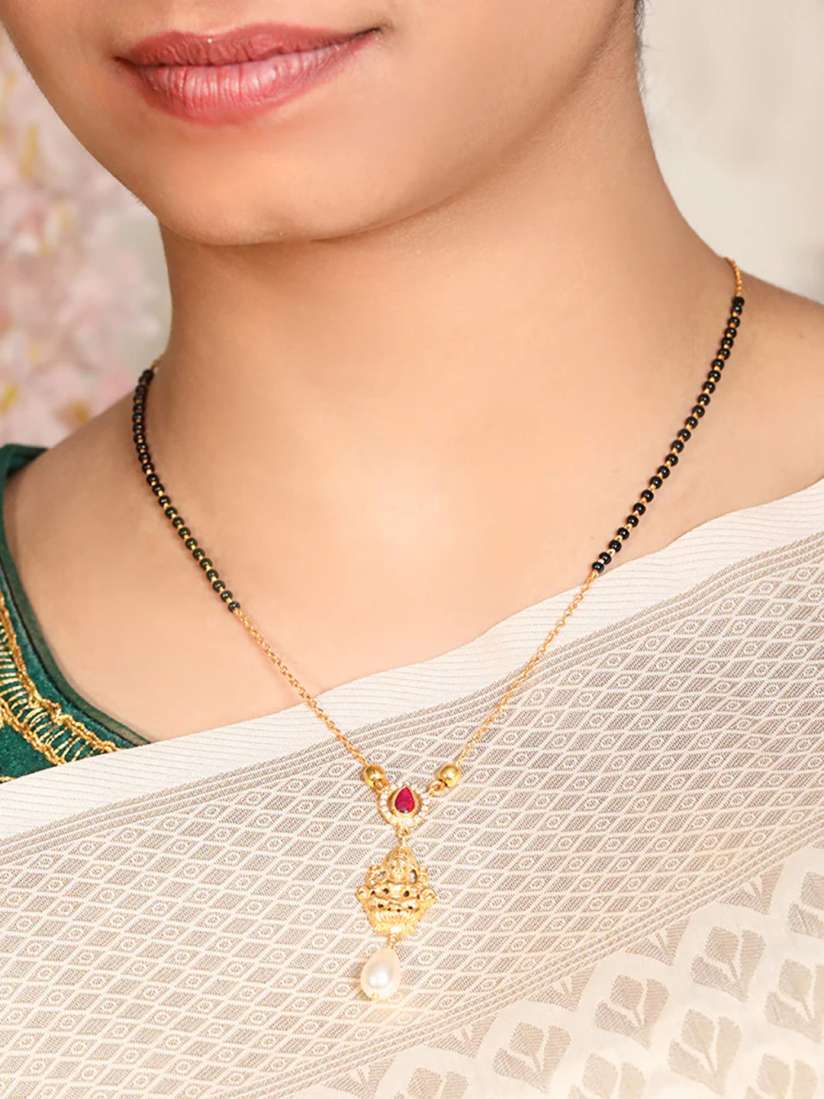 Silver mangalsutra with gold plating top