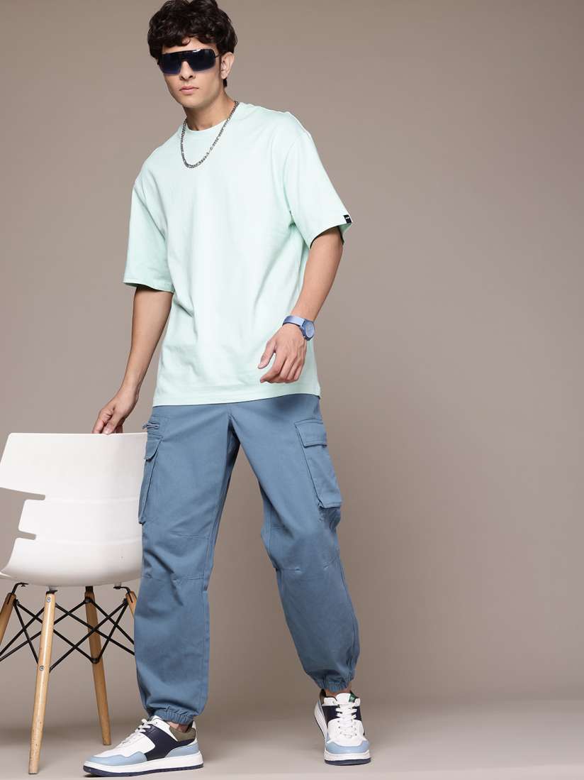 Buy The Roadster Lifestyle Co. Men Loose Fit Pure Cotton Jogger Style Trousers with Zip Detail Trousers for Men 30195789 Myntra