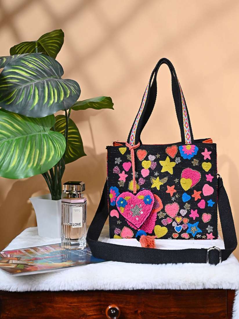 Buy BohoGirl Floral Printed Oversized Swagger Handheld Bag with Tasselled Handbags for Women 30283778 Myntra