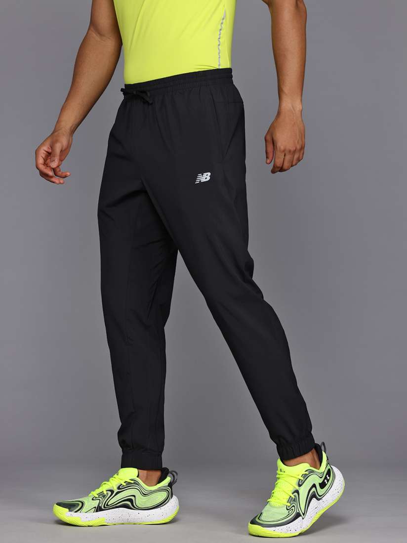 Buy New Balance Men Fast Drying Sport Essentials Woven Running Jogger Track Pants for Men 30683113 Myntra