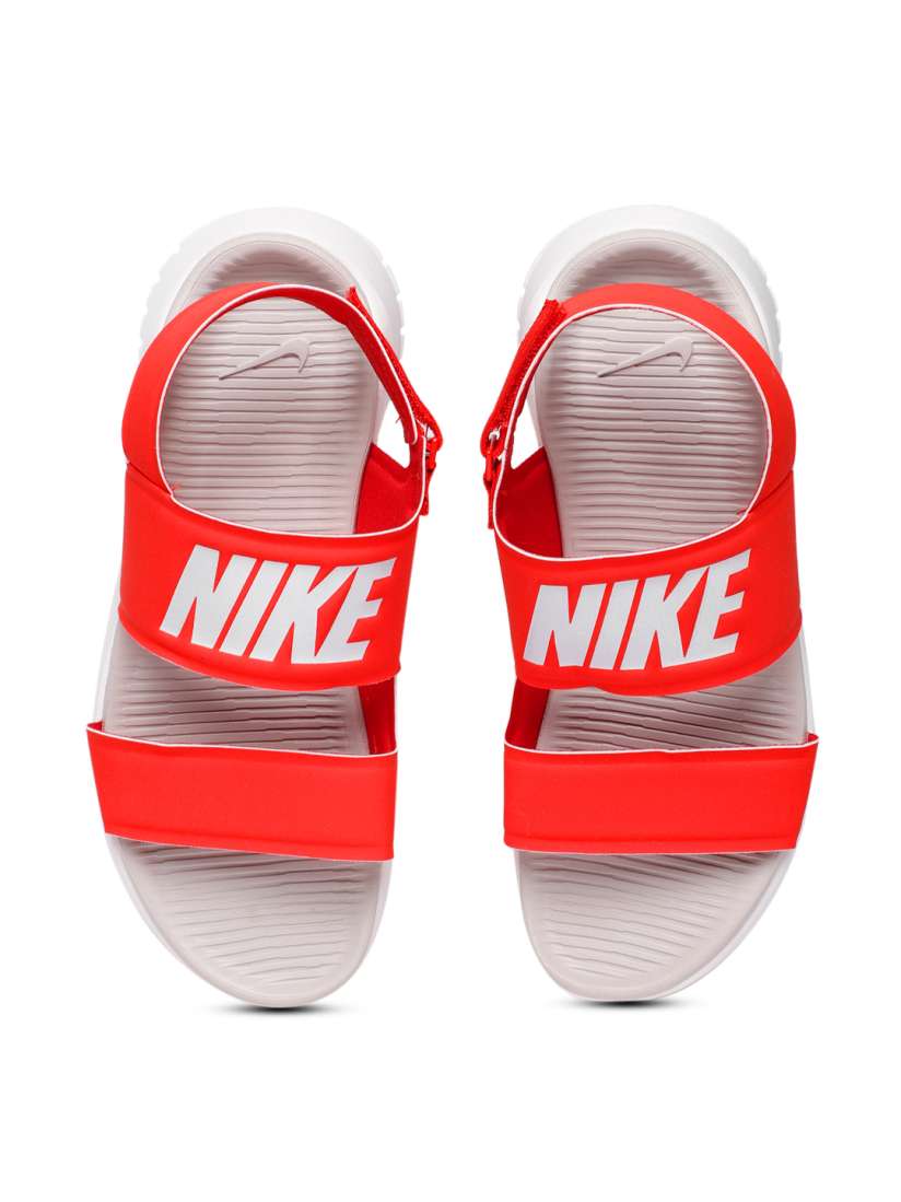 Nike pink tanjun sandals hot sale