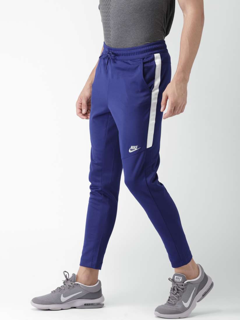 Nike tribute track pants blue online