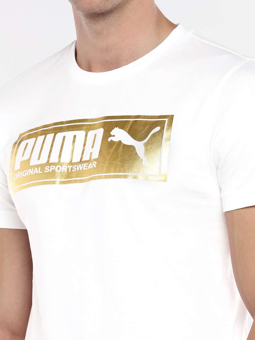 White and gold puma t shirt on sale