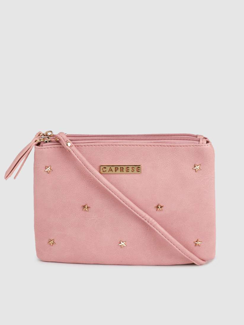 Caprese pink solid sling bag shop