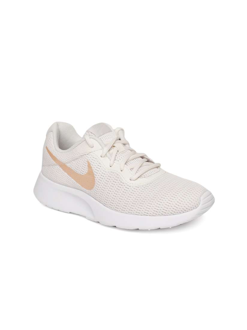 Buy Nike Women White Solid Tanjun Sneakers Casual Shoes for Women 7487742 Myntra