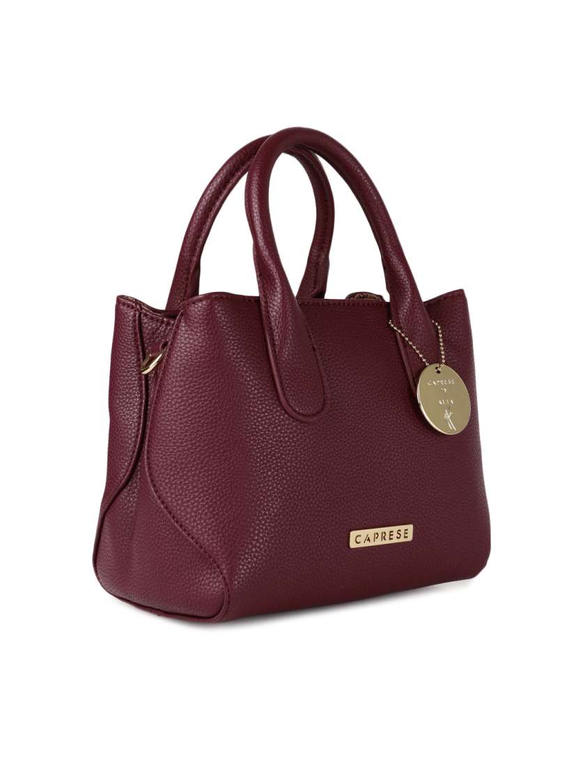 Caprese maroon solid handheld bag top