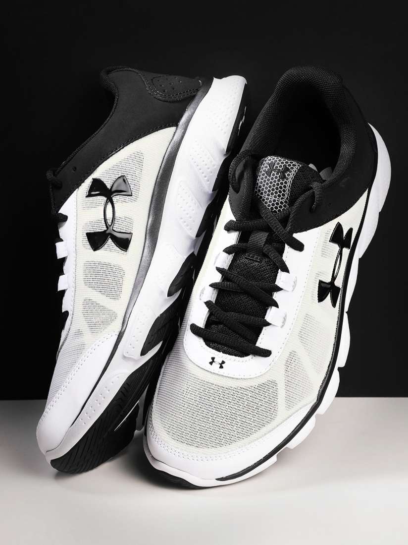 Buy UNDER ARMOUR Men White Black UA Micro G Assert 7 Colourblocked Running Shoes Sports Shoes for Men 7589784 Myntra