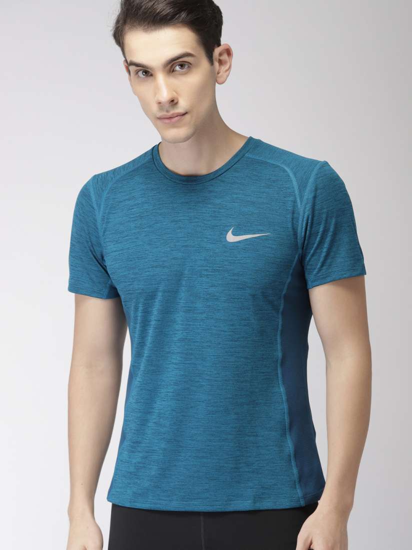 Teal color nike shirt store