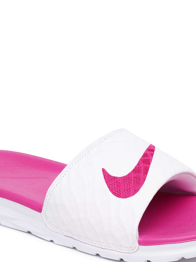 Pink and white nike flip flops store