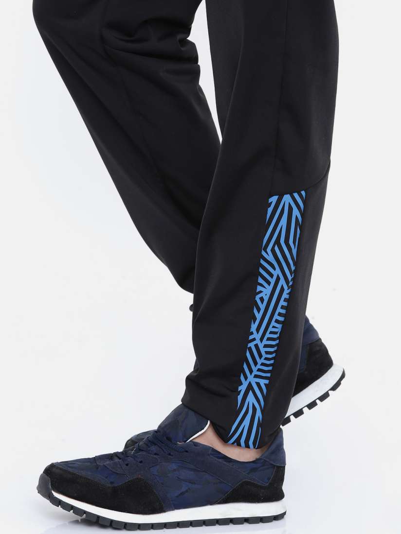 Buy Puma Men Blue Black Graphic Tricot Op Tracksuit Tracksuits for Men 8755917 Myntra
