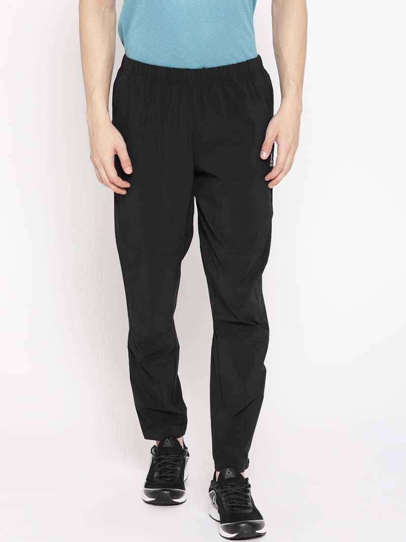 Reebok solid men's track pants online