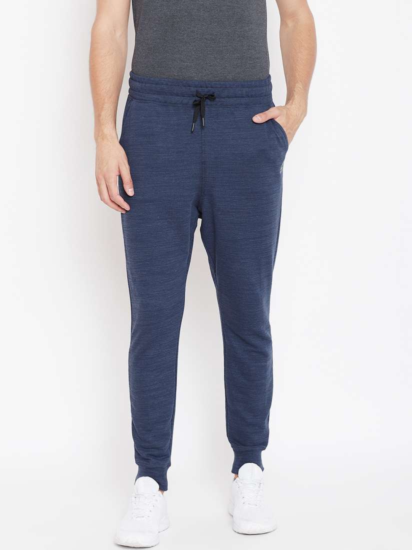 Reebok solid men's track pants online