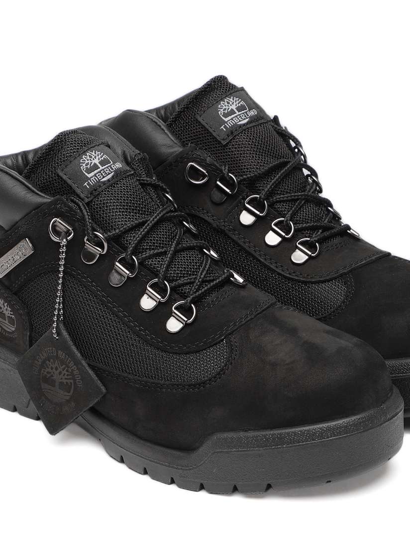 Solid black timberlands shop