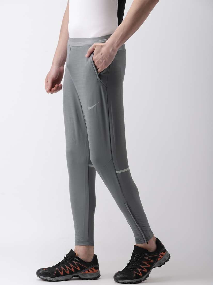 Buy Nike Men Grey Solid AS PHNM Track Pants - Track Pants for Men 9621319 |  Myntra