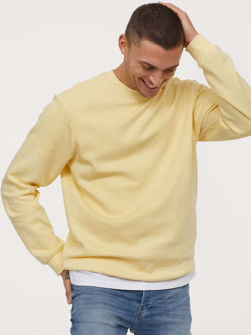 H and m yellow sweatshirt on sale