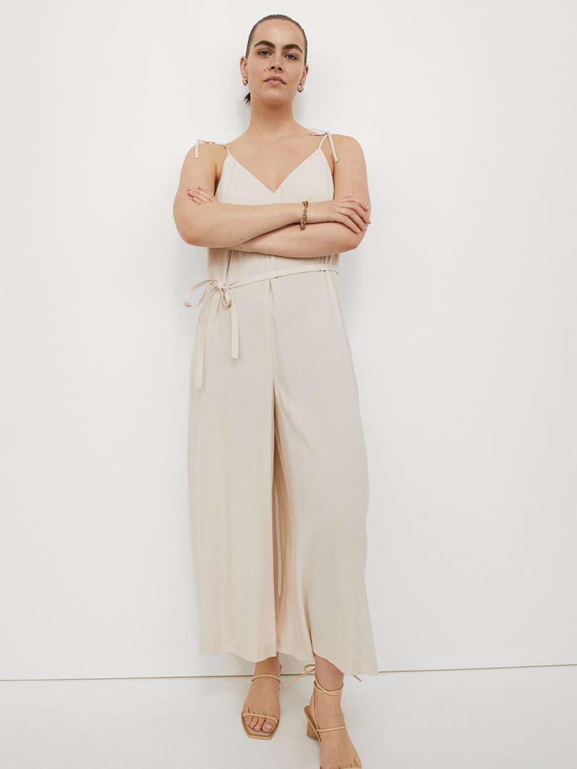 Buy H M Women Beige Solid Lyocell Blend Jumpsuit Jumpsuit for Women from H M at Rs. 2299. Style ID 14420682