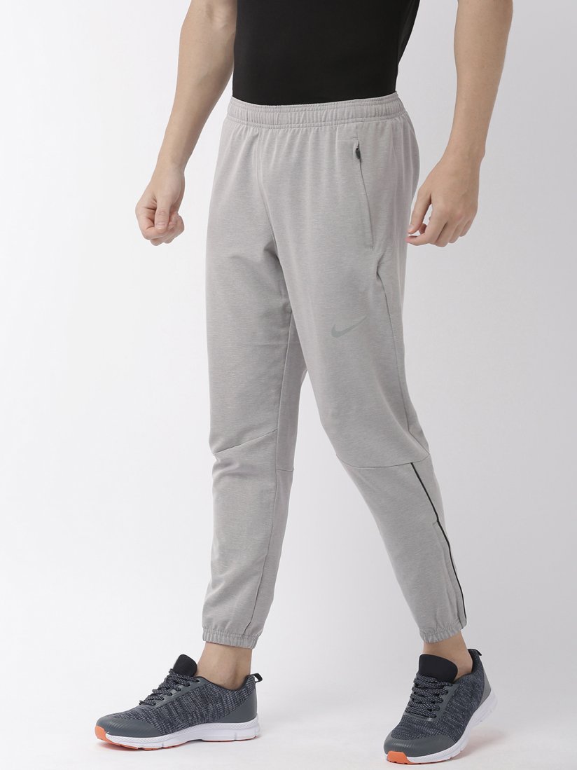 Nike gray essentials slim sweatpants hot sale